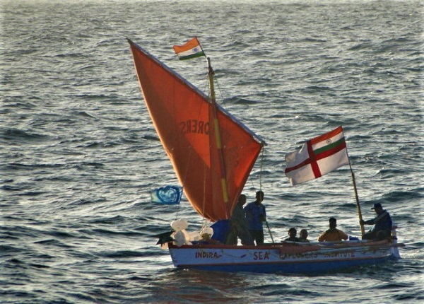 People standing on boat in Bay of Bengal